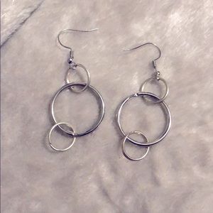 There are three cute earring with a nice necklace